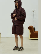 USAGE Crinkle Nylon Hooded Track Jacket in Brown - On Male Model
