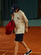 USAGE Retro Tennis Graphic Cotton T Shirt in Gray - On Male Model