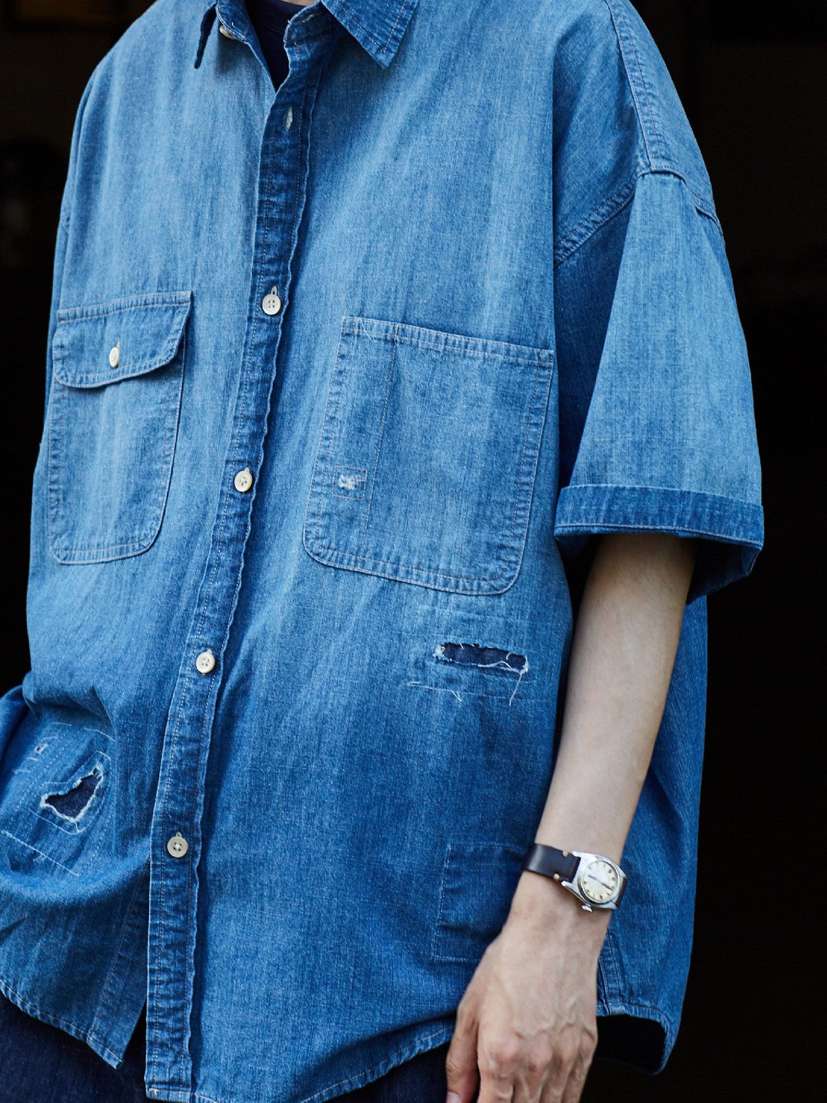 USAGE Distressed Short Sleeve Denim Shirt in Denim - On Male Model