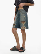 MASONPRINCE Washed Distressed Denim Shorts in Denim - On Male Model