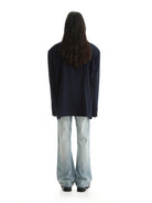 MASONPRINCE Minimalist Textured Two Button Blazer in Navy Blue - On Model