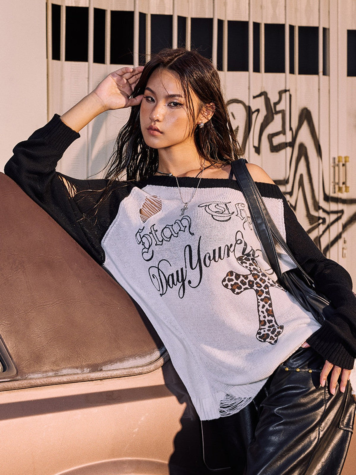 BEERBRO Distressed Graphic Off Shoulder Sweater in Black - On Female Model