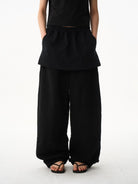 BLINDNOPLAN Layered Cotton Blend Sweatpants in Black - On Model