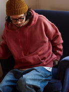 USAGE Faded Vintage Wash Hoodie in Red - On Male Model