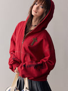 BEERBRO Studded Cross Zip Up Hoodie in Red - On Female Model