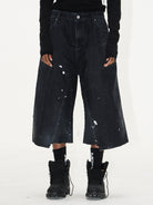 BLINDNOPLAN Ink Splatter Denim Carpenter Shorts in Black - On Model