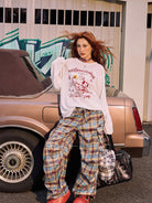 BeerBro Graffiti Plaid Strap Cargo Pants in Sky Blue - On Female Model