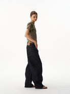 BLINDNOPLAN Curved Wide Leg Raw Denim Jeans in Denim - On Female Model