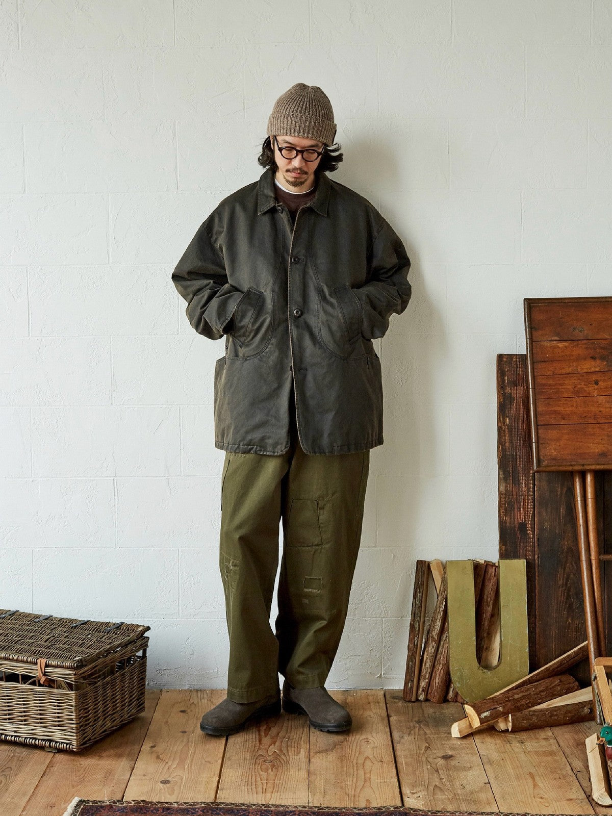 USAGE Hand Distressed Patched Chinos in Olive - On Male Model