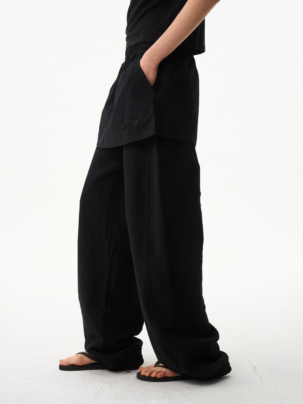 BLINDNOPLAN Layered Cotton Blend Sweatpants in Black - On Model
