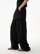 BLINDNOPLAN Layered Cotton Blend Sweatpants in Black - On Model
