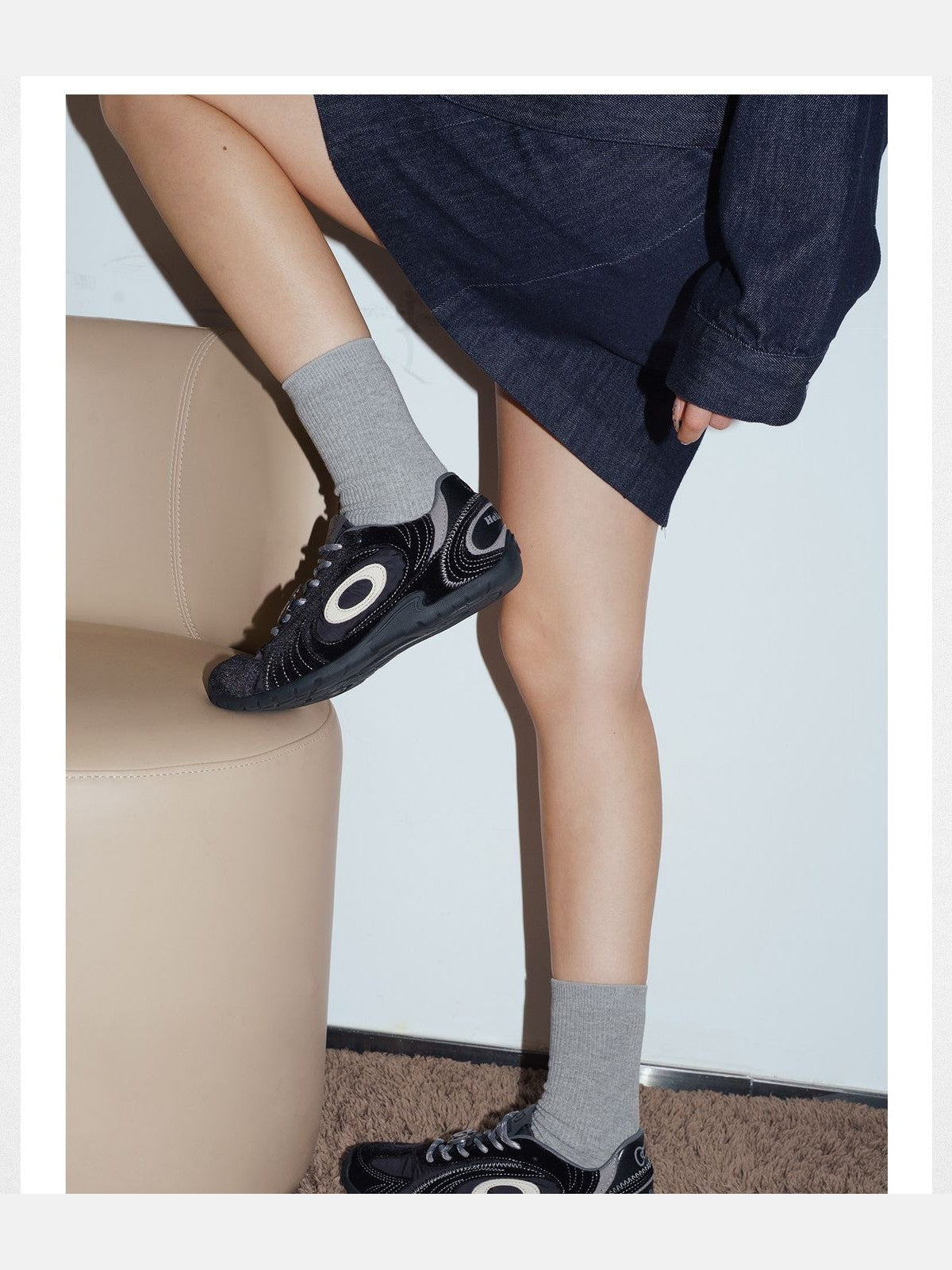 OLDORDER Hello Kitty Velvet GAT Sneakers in Black - On Female Model