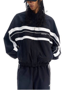 BLINDNOPLAN Color Blocked Zip Up Track Jacket in Black - On Male Model