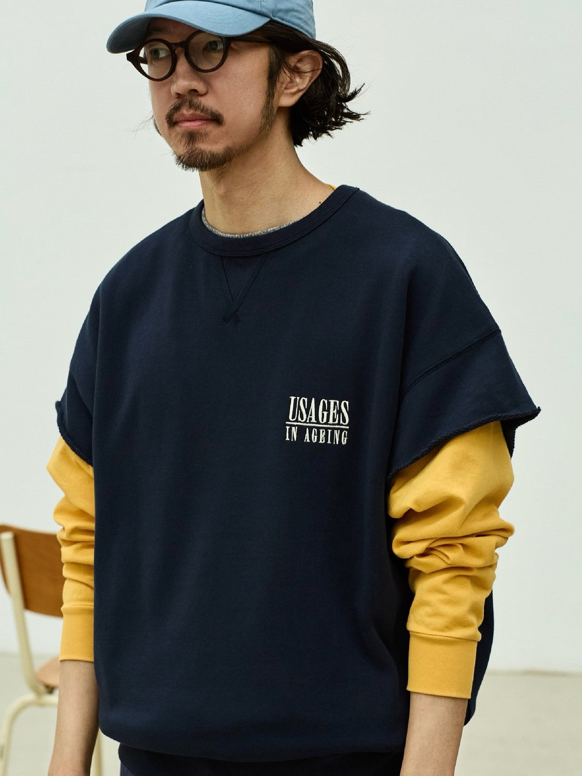 USAGE Raw Edge Cotton Short Sleeve Sweatshirt in Navy Blue - On Male Model