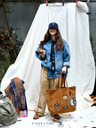 USAGE Washed Distressed Denim Shirt in Denim - On Female Model
