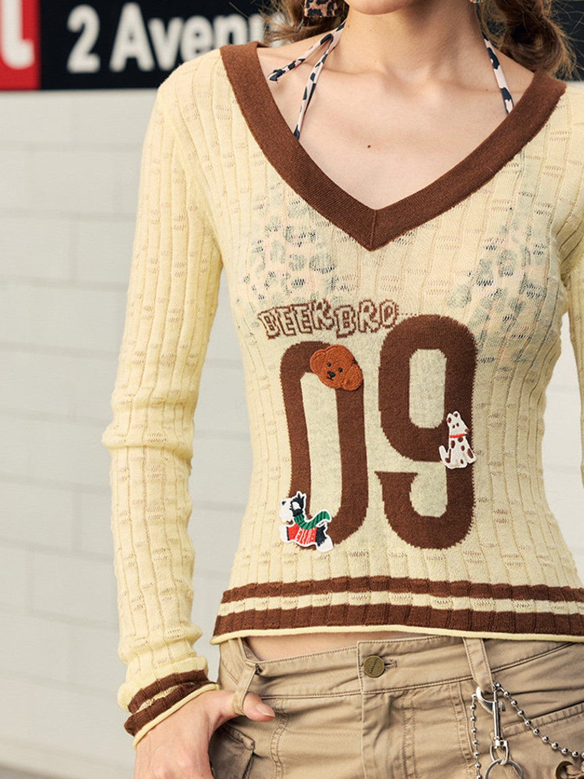 BEERBRO Puppy Patch Sheer Knit V Neck in Cream - On Female Model