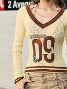 BEERBRO Puppy Patch Sheer Knit V Neck in Cream - On Female Model