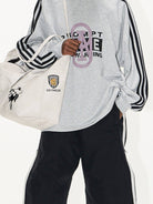 BLINDNOPLAN Color Block Graphic Raglan Sweatshirt in Gray - On Model