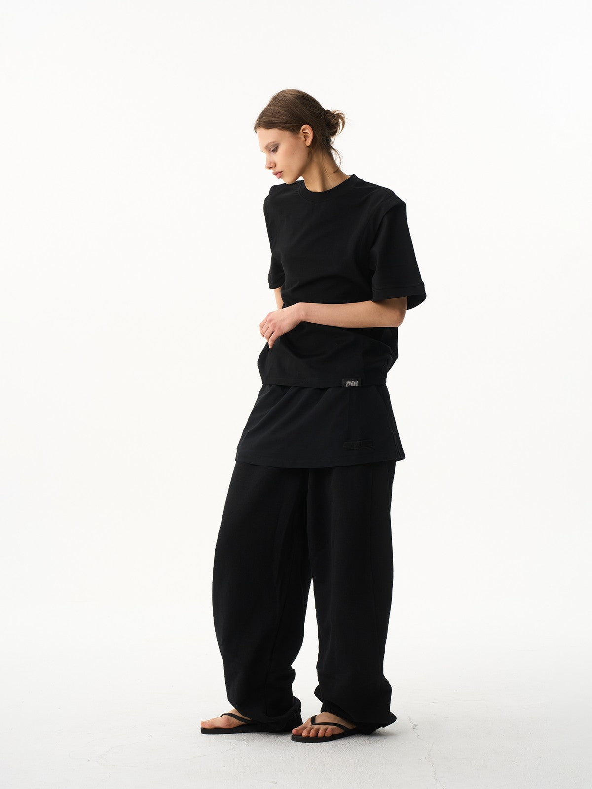 BLINDNOPLAN Layered Cotton Blend Sweatpants in Black - On Female Model