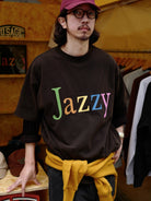 USAGE JZ Festival Graphic Cotton T Shirt in Black - On Male Model