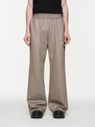 BLINDNOPLAN Metallic Logo Zip Hoodie Pants Set in Beige - On Model