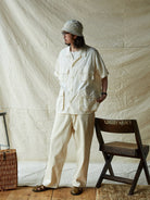 USAGE Vintage Neppy Cotton Straight Leg Jeans in Cream - On Male Model