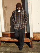 USAGE Heavyweight Herringbone Baker Pants in Navy Blue - On Male Model