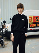 SOD Embroidered Mock Neck Top in Black - On Male Model
