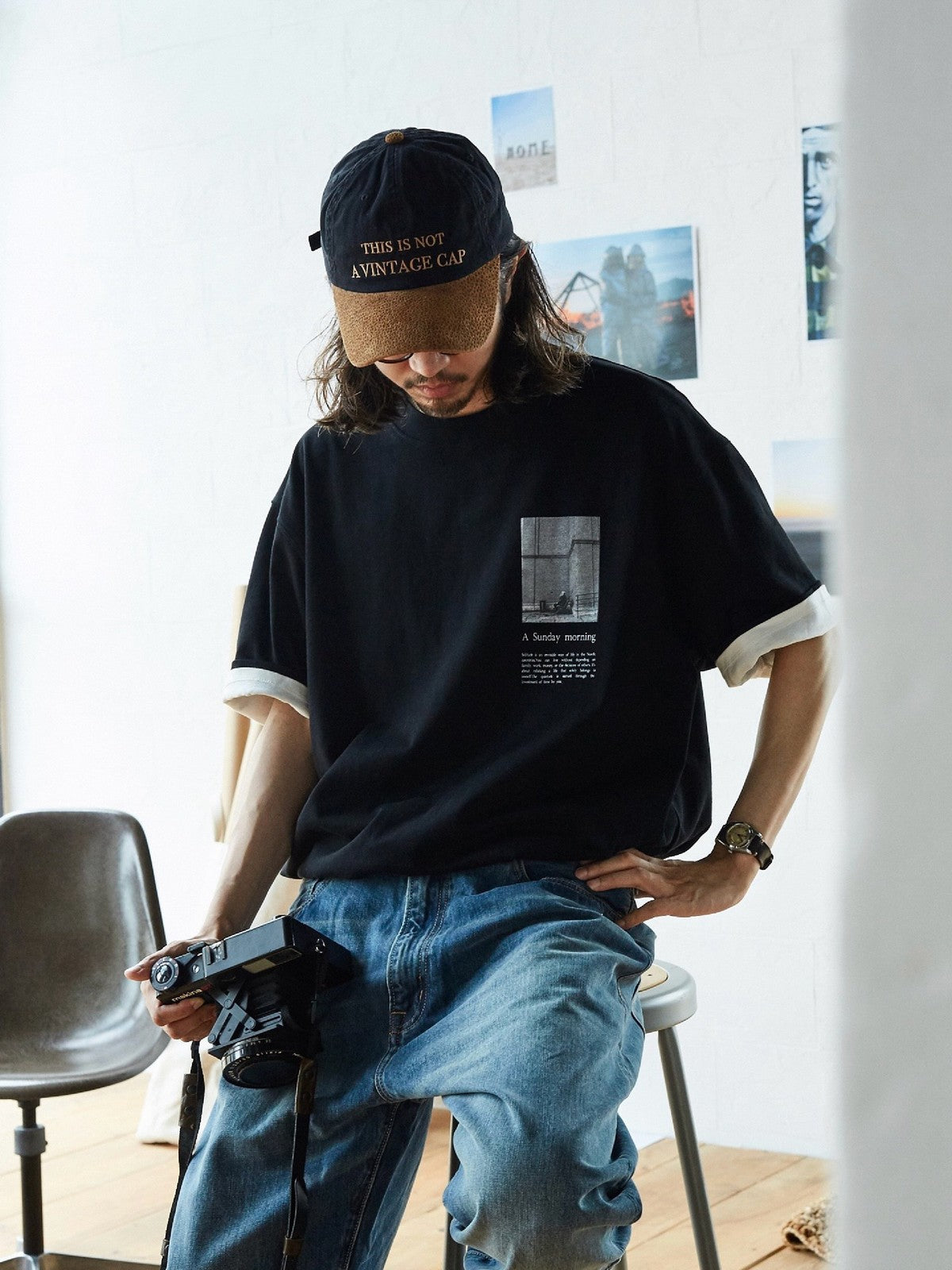 USAGE Air Spun Cotton Graphic T Shirt in Black - On Male Model