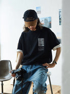 USAGE Air Spun Cotton Graphic T Shirt in Black - On Male Model