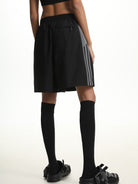 MASONPRINCE Striped Cotton Blend Track Shorts in Black - On Model