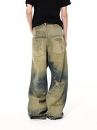 UNKNOWNWORLD Heavyweight Distressed Wide Leg Jeans in Denim - On Model