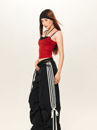 BEERBRO Drawstring Wide Leg Parachute Pants in Black - On Female Model