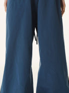 BLINDNOPLAN Contrast Panel Pleated Parachute Pants in Blue - On Model