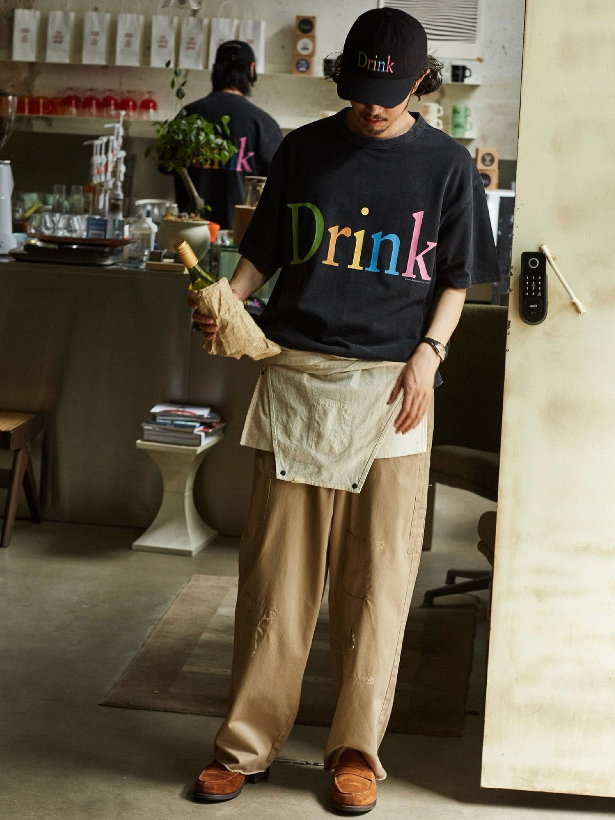 USAGE Faded Rainbow Logo T Shirt in Black - On Male Model
