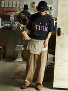 USAGE Faded Rainbow Logo T Shirt in Black - On Male Model