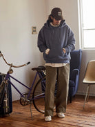 USAGE Faded Vintage Wash Hoodie in Blue - On Male Model