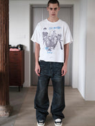 UNKNOWNWORLD Oil Stain Mud Dye Straight Jeans in Blue - On Male Model