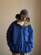 USAGE Cotton Nylon Hooded Mountain Parka in Blue - On Male Model