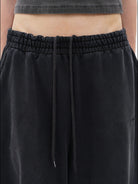 MASONPRINCE Double Layered Cotton Joggers in Black - On Female Model