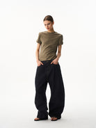 BLINDNOPLAN Curved Wide Leg Raw Denim Jeans in Denim - On Female Model