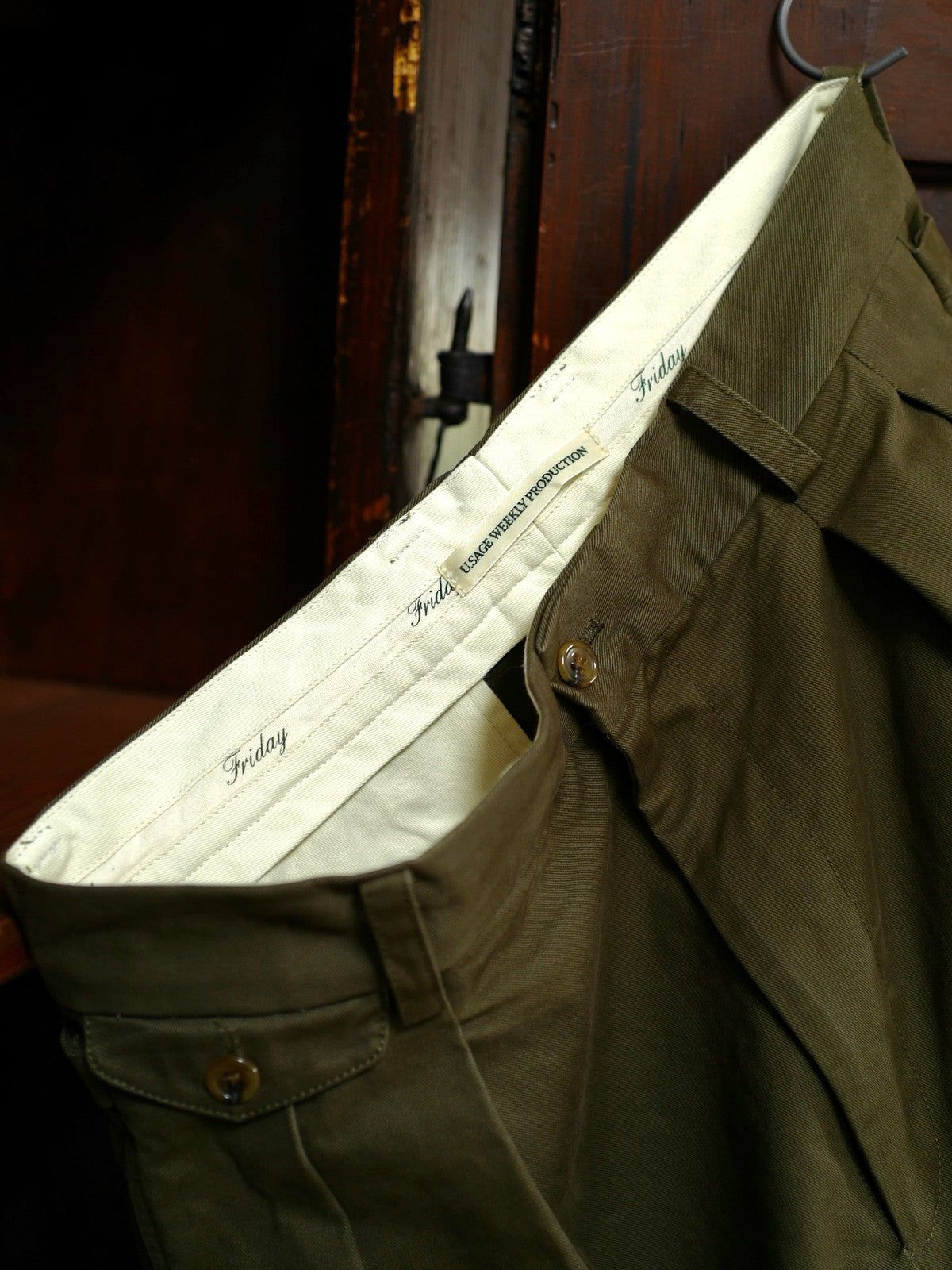 USAGE Pleated Cotton Twill Chinos in Olive - Lifestyle