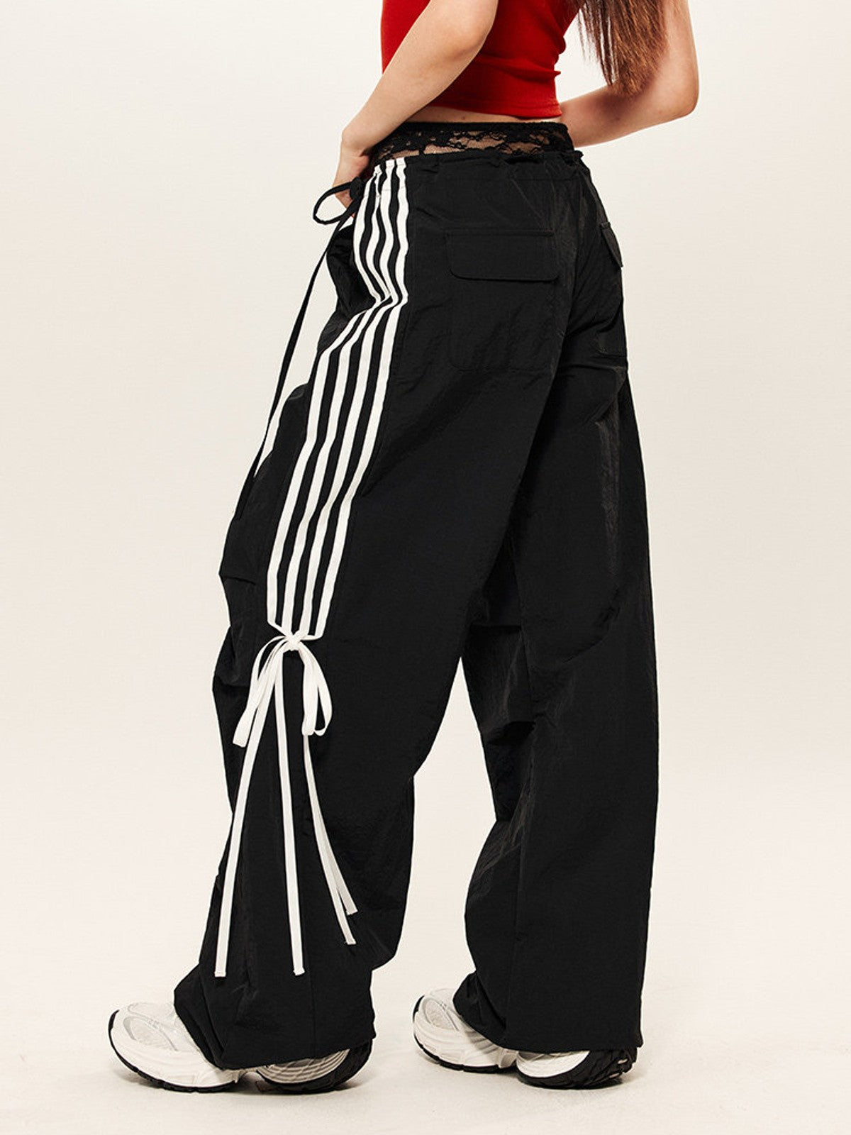BEERBRO Drawstring Wide Leg Parachute Pants in Black - On Female Model