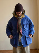 USAGE Cotton Nylon Hooded Mountain Parka in Blue - On Male Model