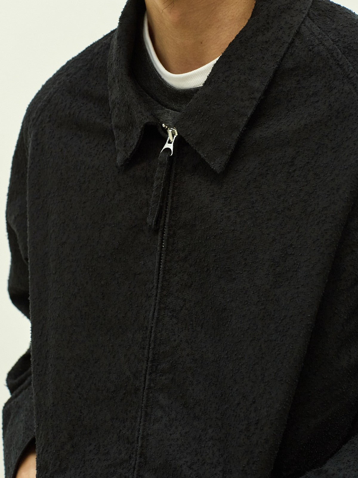 USAGE Textured Nep Blouson Jacket in Black - On Male Model