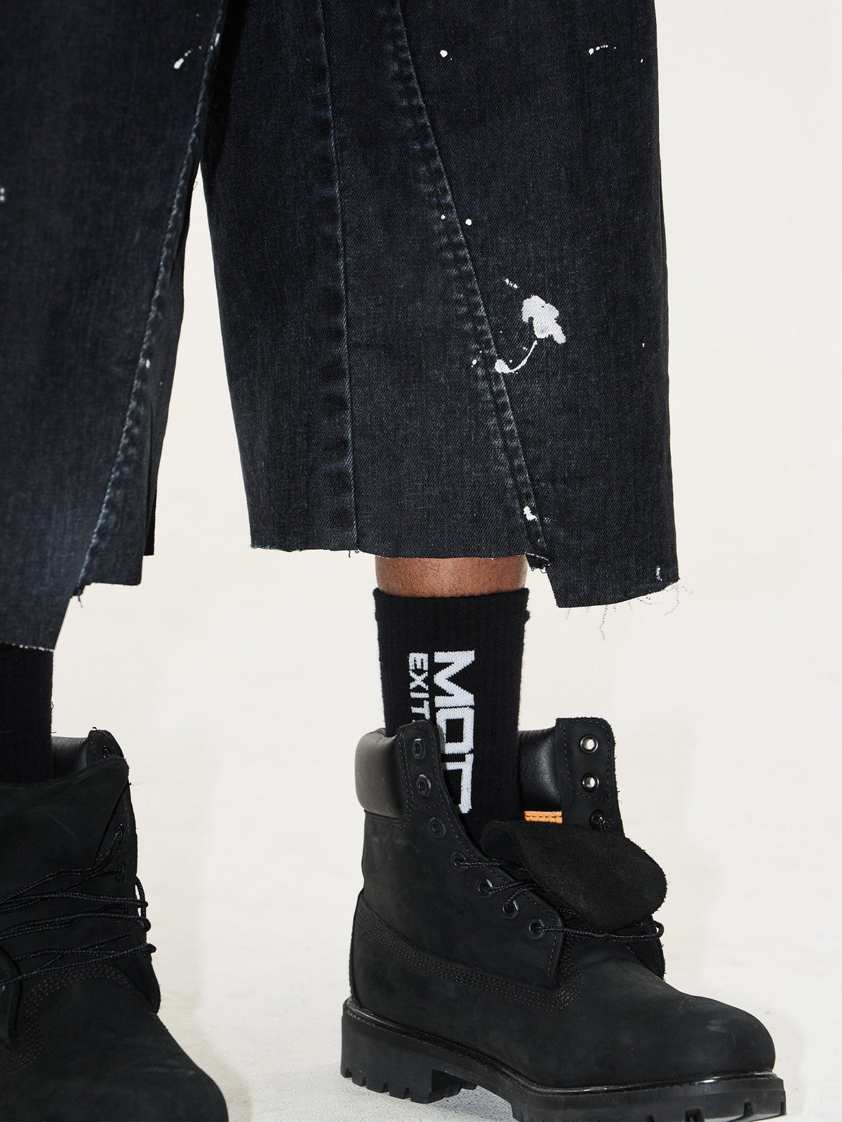 BLINDNOPLAN Ink Splatter Denim Carpenter Shorts in Black - On Model