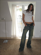 FaxCopyExpress Curved Panel Dirty Wash Jeans in Denim - On Female Model