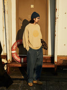 USAGE Washed Cotton Raglan Smiley Sweatshirt in Beige - On Male Model