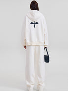 SMFK Embroidered Cotton Zip Up Hoodie in White - On Model