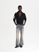 MASONPRINCE Faded Slub Flared Jeans in Denim - On Male Model